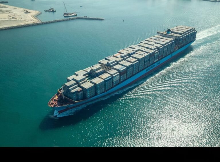 Dubai skyline with bustling port activity, symbolizing the city’s booming trade and strong real estate market.