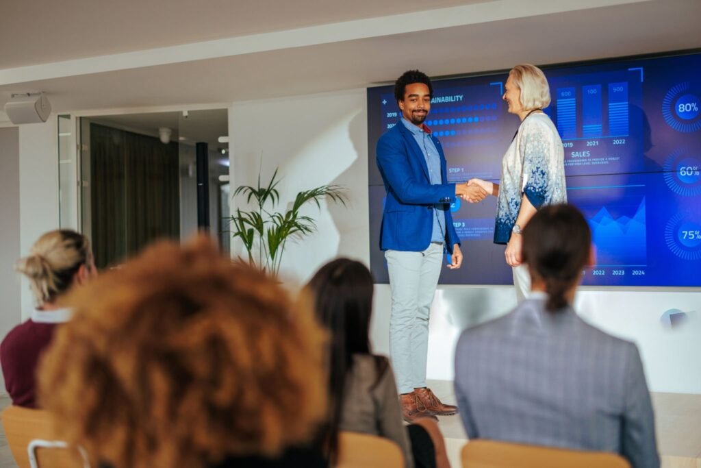 Business leader guiding a team with AI-driven insights and digital strategy tools.