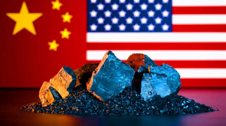 Stack of rare-earth mineral samples with U.S. and China flags in background