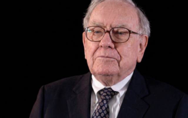 Warren Buffett at a meeting marking the end of his tenure as CEO.