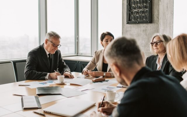 AI agents reshaping corporate hierarchy in a modern enterprise boardroom